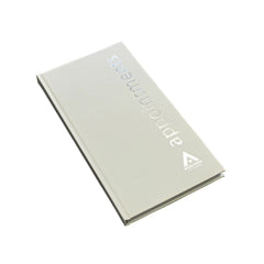 The front of a white appointment book on a white background.