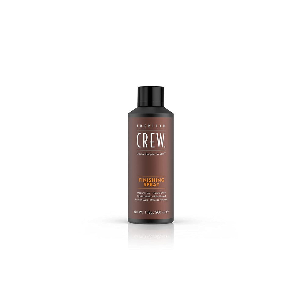 American Crew finishing spray bottle with a black cap and a label that includes the product name and volume information.