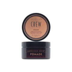 American Crew pomade pot on a white background.
