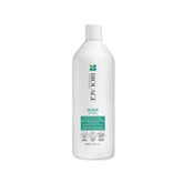 A bottle of Biolage Scalpsync Clarifying Shampoo.