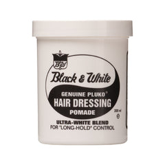 A container of Black & White Genuine Pluto Hair Dressing Wax, labeled as 'Ultra-White Blend' for long-hold control.