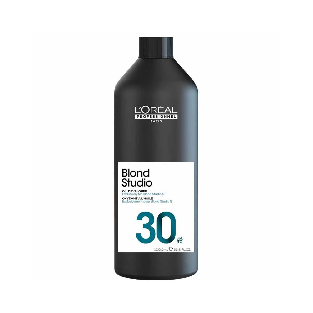 A 1000ml black bottle of Blond Studio on a white background.