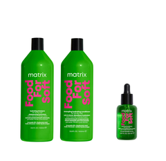 Three bottles of Matrix Total Results Food For Soft hair care products, including a shampoo, conditioner, and oil.
