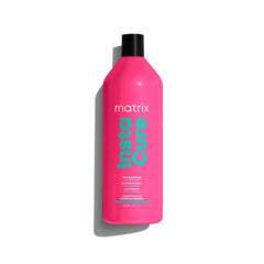 Pink conditioner bottle with black lid