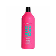 Pink Matrix Insta Cure bottle with black cap on a bright pink background.
