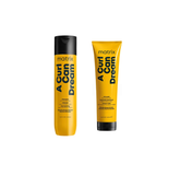 Two bottles of Matrix Total Results A Curl Can Dream hair care products, one for shampoo and one for mask, with yellow and black labeling.
