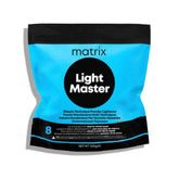 A package of Matrix Light Master Lightening Powder, 500g, designed for creating higher hair lift and achieving lighter tones.