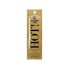 Australian Gold Hot! sachet, with a gold color packaging, related to beauty and tanning products.