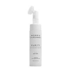 White bottle branded Rose & Caramel tan remover with a white background.