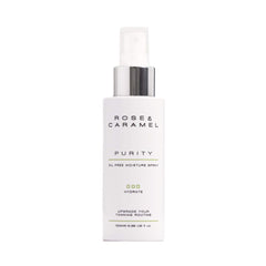 White bottle branded Rose & Caramel Purity Moisture Spray with a white background.