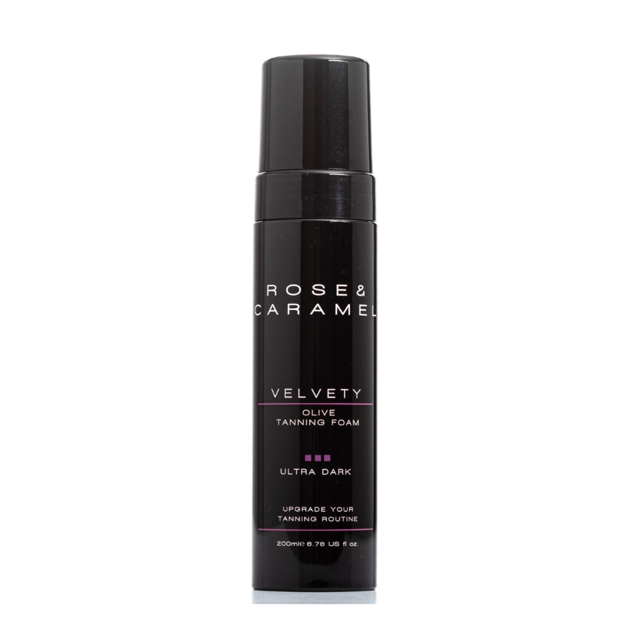 Black bottle branded Rose & Caramel ultra Dark foam tan on a white background.