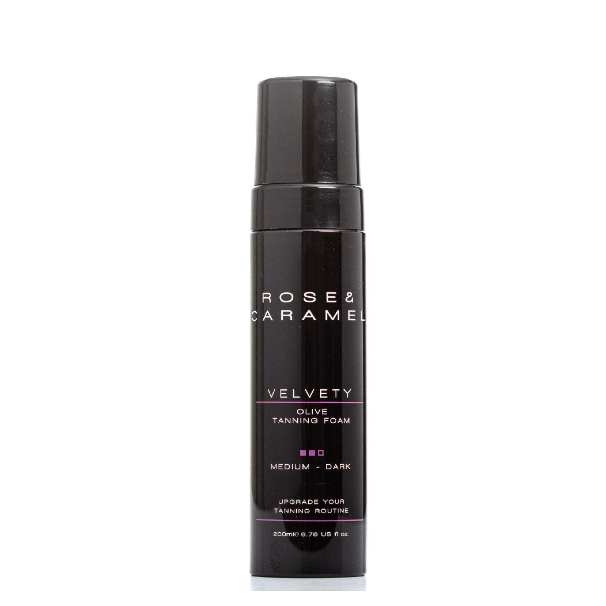 Black bottle branded Rose & Caramel Medium to Dark foam tan on a white background.