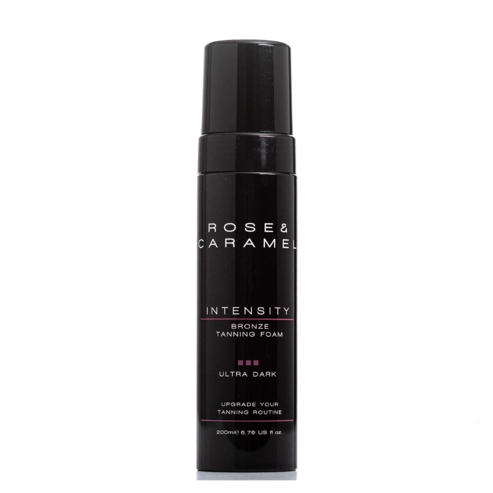 Black bottle branded Rose & Caramel. Bronze Tanning foam in the shade ultra dark with a white background.