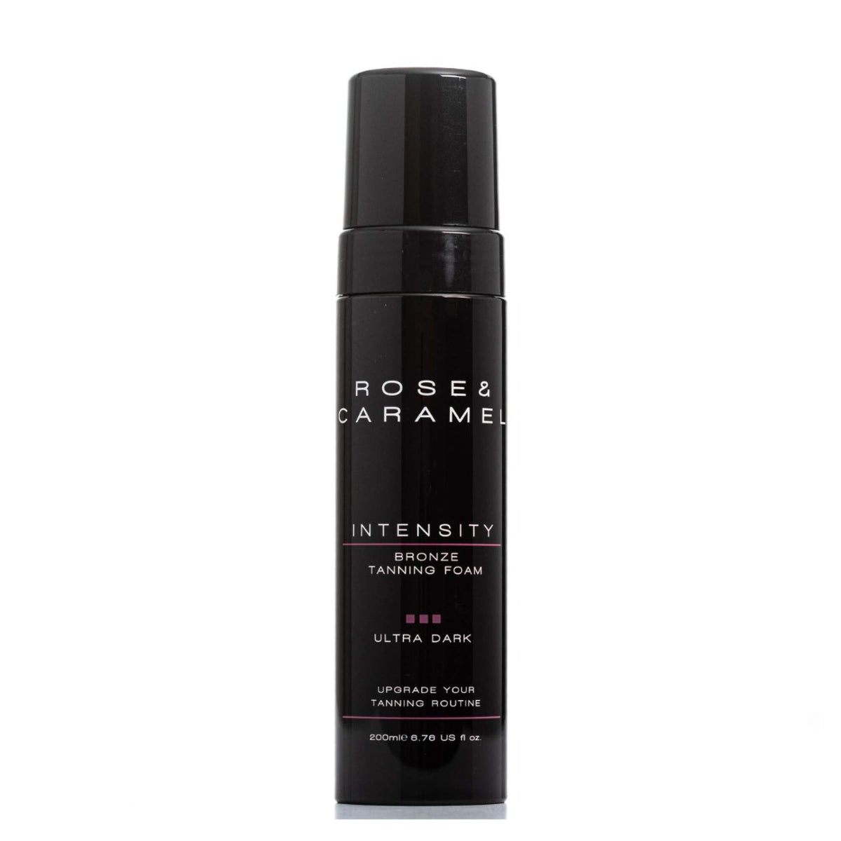 Black bottle branded Rose & Caramel. Bronze Tanning foam in the shade ultra dark with a white background.