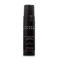 Black bottle branded Rose & Caramel. Bronze Tanning foam in the shade ultra dark with a white background.