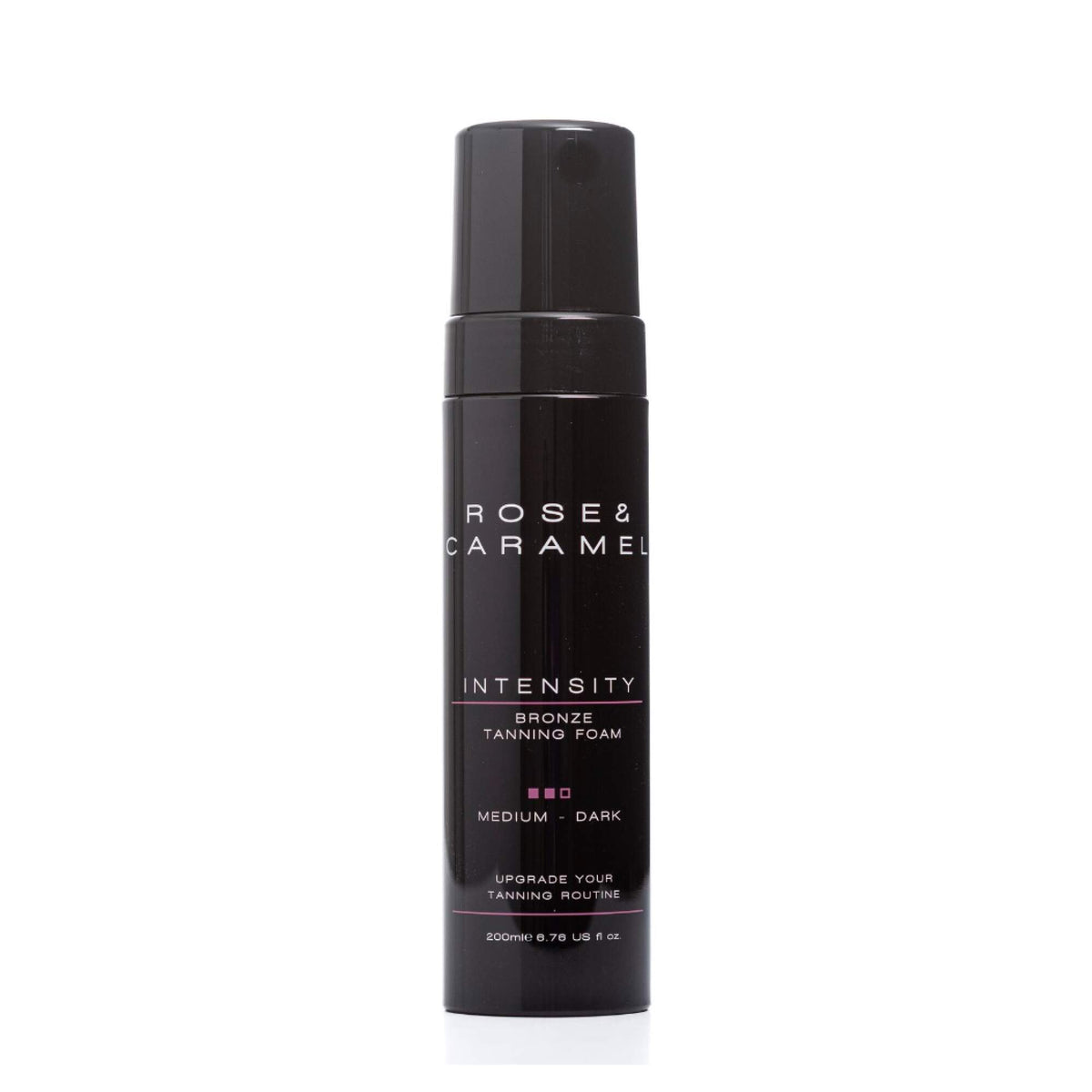 Black bottle branded Rose & Caramel. Bronze tanning foam in shade medium/dark with a white background. 