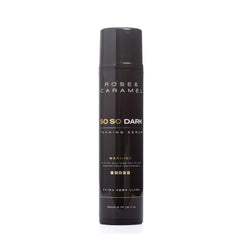 Black bottle branded Rose & Caramel so so dark tanning serum on a white background.