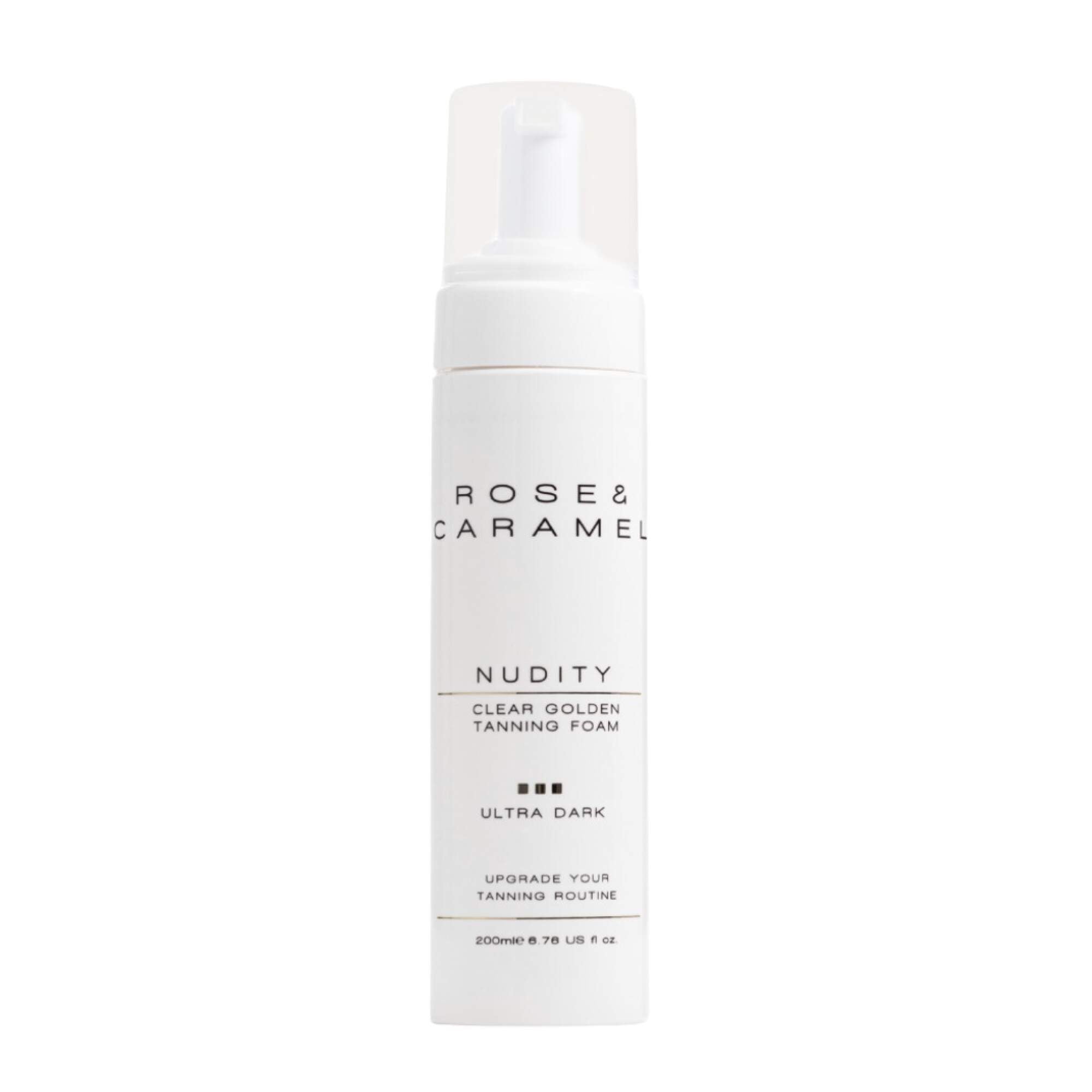 White bottle branded Rose & Caramel clear golden tanning foam with a white background. 