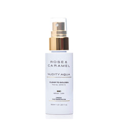 White bottle with gold lid branded Rose & Caramel, facial spritz with a white background. 