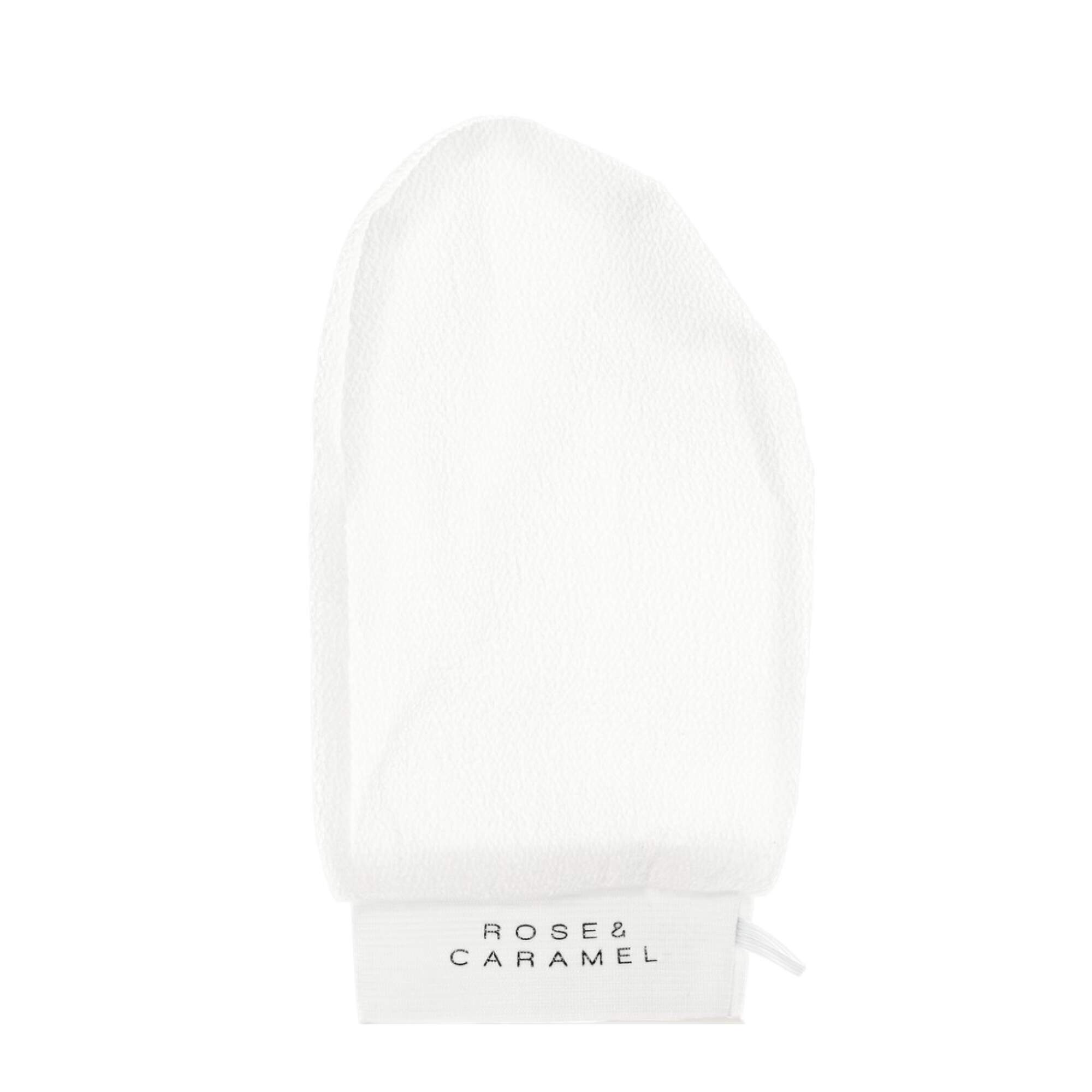 White exfoliating tanning mitt branded Rose & Caramel.