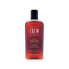 Bottle of American Crew Daily Moisturizing Conditioner with a black cap, labeled for men's hair care.