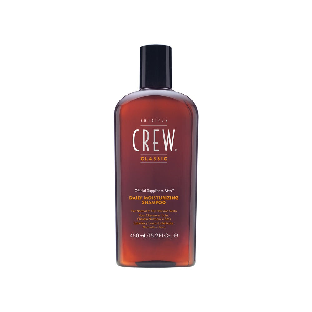 Bottle of American Crew Daily Moisturizing Shampoo with a dark cap, against a white background.