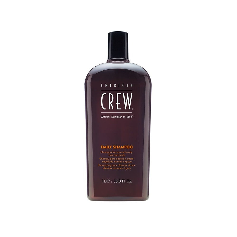 Bottle of American Crew Daily Shampoo with a capacity of 1000ml, primarily for men's hair care.