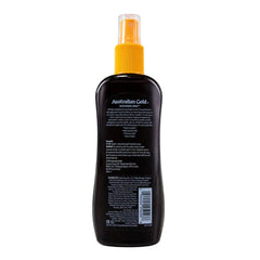 A bottle of Australian Gold UV Protectant spray shown from the back, featuring a dark brown bottle with a bright yellow spray nozzle and a clear cap, on a white background.