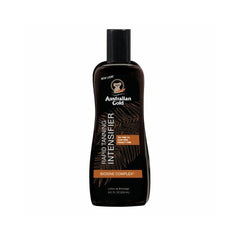 Australian Gold Rapid Tanning Intensifier in a black bottle with a label showing a palm tree and product details.