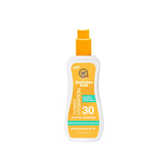 Australian Gold SPF 30 Clear Spray Gel Sunscreen in a white bottle with an orange cap.