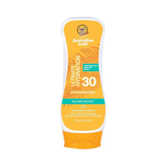 Australian Gold SPF 30 Lotion Sunscreen in a yellow bottle with a white pump, labeled as 'Ultimate Hydration' with an SPF 30 sun protection factor.