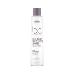 A 250ml white bottle of shampoo with brown text on a white background. 