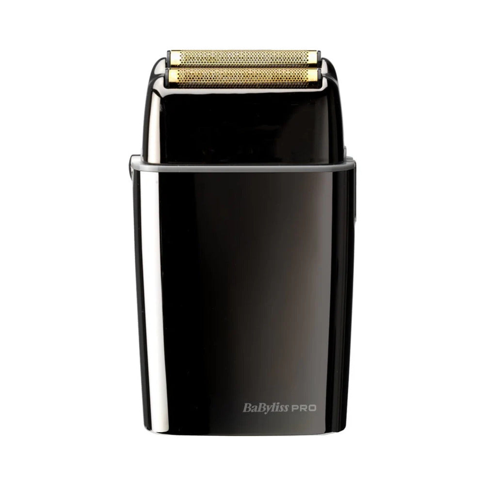 Dual foil shaver with the lid off on  white background. 
