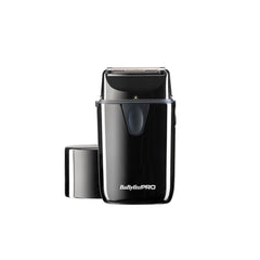 A black BaByliss PRO single foil shaver with UV disinfection feature, displayed alongside its cap and charging port.