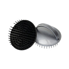 A black and silver circular palm-sized hairbrush with flexible, round-ended pins.
