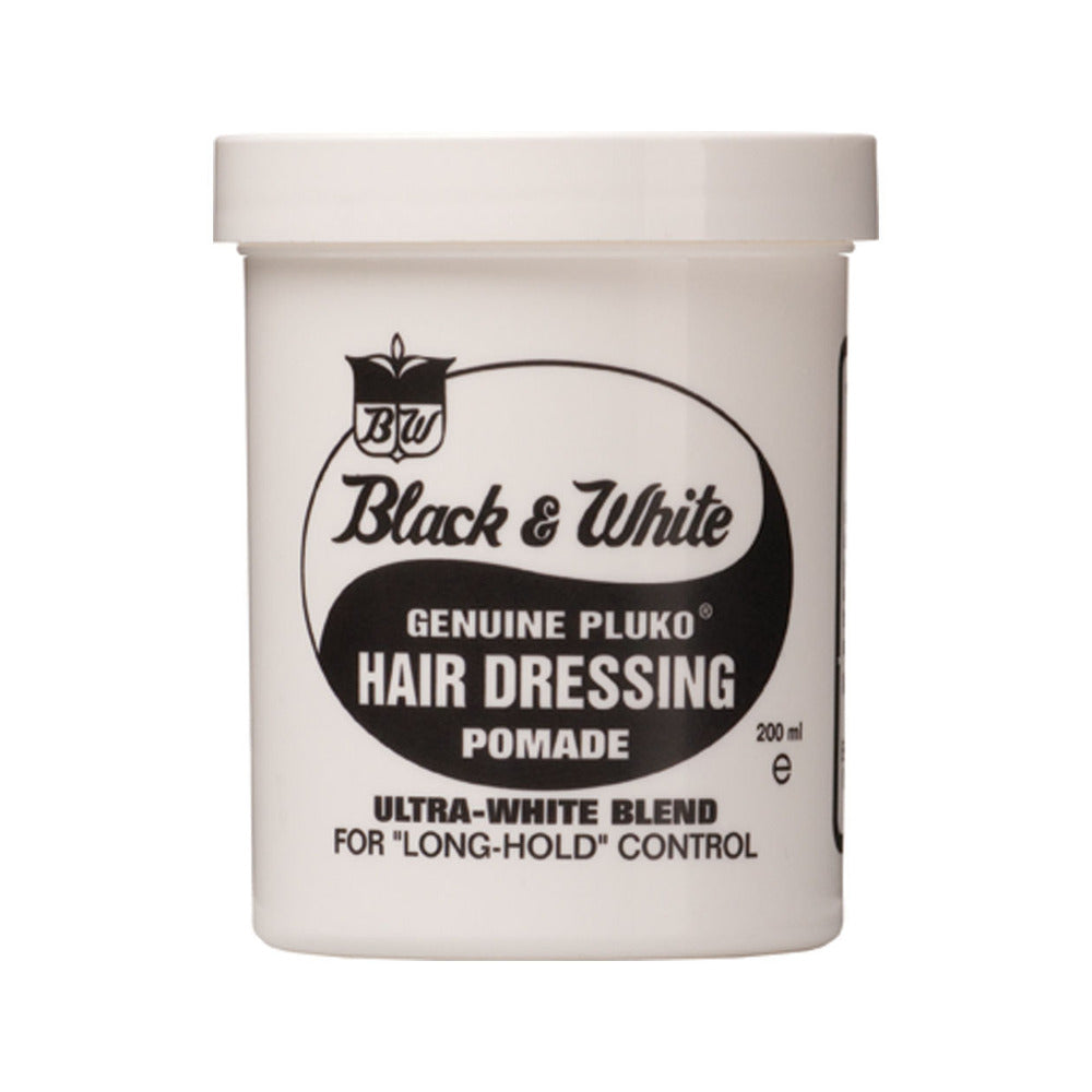 A container of Black & White Genuine Pluto Hair Dressing Wax, labeled as 'Ultra-White Blend' for long-hold control.