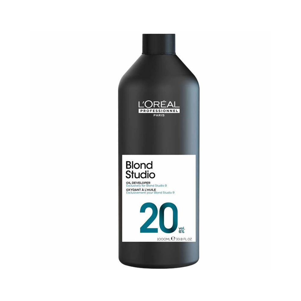 A 1000ml black bottle of Blond Studio 20 vol on a white background. 