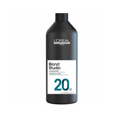 A 1000ml black bottle of Blond Studio 20 vol on a white background. 