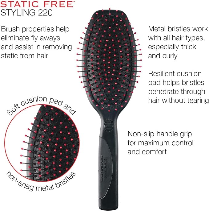 A black hairbrush with metal bristles and a soft cushion pad, shown on a white background with marketing text and a circular close-up inset highlighting the bristle and cushion pad details.