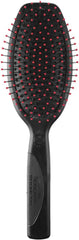 A black paddle hairbrush with red-tipped bristles and a textured handle, shown against a plain white background.