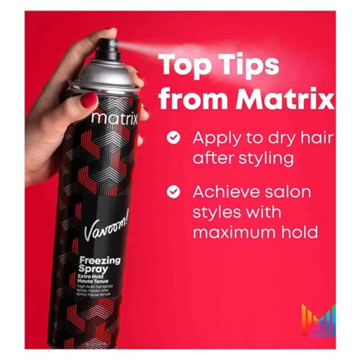 A can of Matrix Vavoom Freezing Spray Extra Hold hairspray with a black and red geometric design.