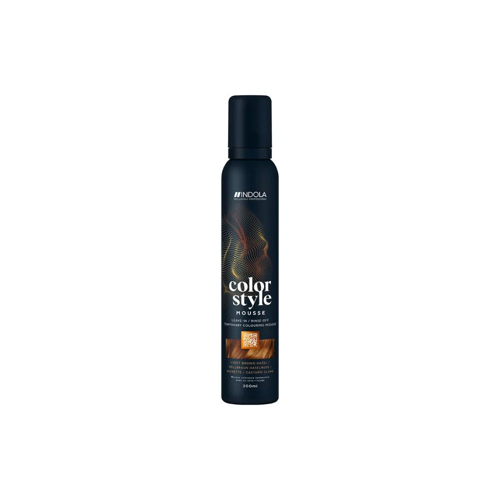 The bottle features the white Indola logo at the top, followed vertically by the product name "color style MOUSSE" written in stylized fonts. A rectangular image swatch on the front label displays a glossy texture of wavy hair, indicating the product's shade. The bottom text specifies the bottle size as 200ml.
