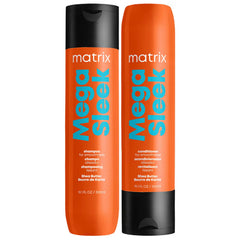 Two Matrix Mega Sleek haircare bottles on a plain white background, one shampoo bottle and one conditioner bottle, both with bright orange bodies and black caps.