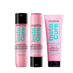 Three Matrix InstaCure haircare products in pink packaging on a white background: a shampoo bottle with a black cap, a conditioner bottle with a black cap, and a liquid mask tube with a black cap.