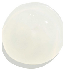 A single smooth, rounded translucent dome-shaped object in a milky off-white color, shown on a plain white background with a soft shadow underneath.