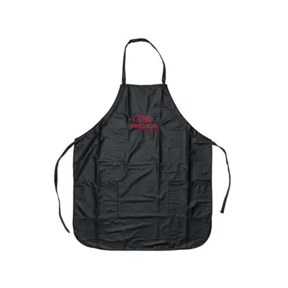 Black colour apron with red writing on it saying Wella on a white back ground. 