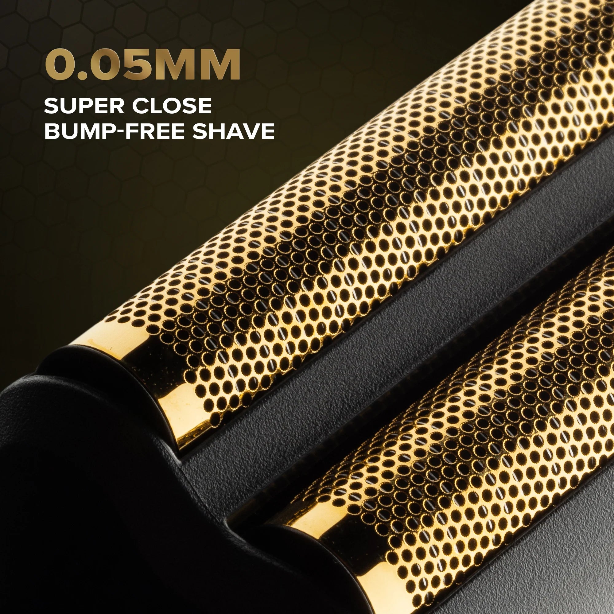 Close-up of a gold and black razor with text indicating '0.05MM Super Close Bump-Free Shave' on a dark background.