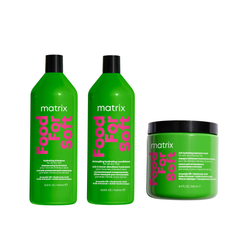 Three green colored bottles of Matrix Total Results hair care products including a shampoo, conditioner, and hair mask.