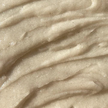 Close-up of a smooth, beige-colored surface with subtle texture