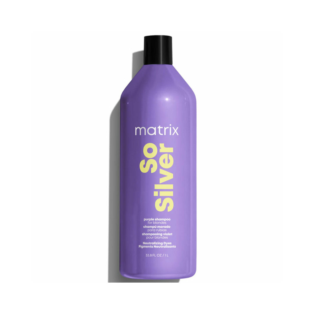Purple Matrix So Silver shampoo bottle with black cap on a purple background.